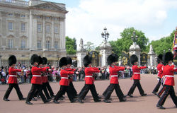 Guards march out of Buckingham Palace at the end of the daily Changing of the Guard ceremony